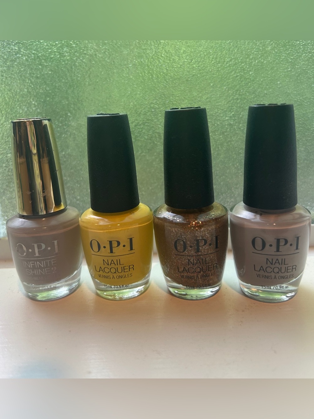 OPI Nail Polish Quartet - Yellow, Taupe, Brown Shimmer, and Light Taupe